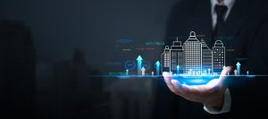 Palma da mão com gráficos de empresa representando lucro real